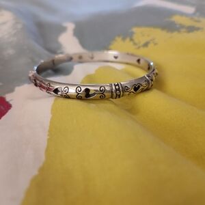 Vintage-Inspired Silver Bangle Bracelet with Intricate Detailing